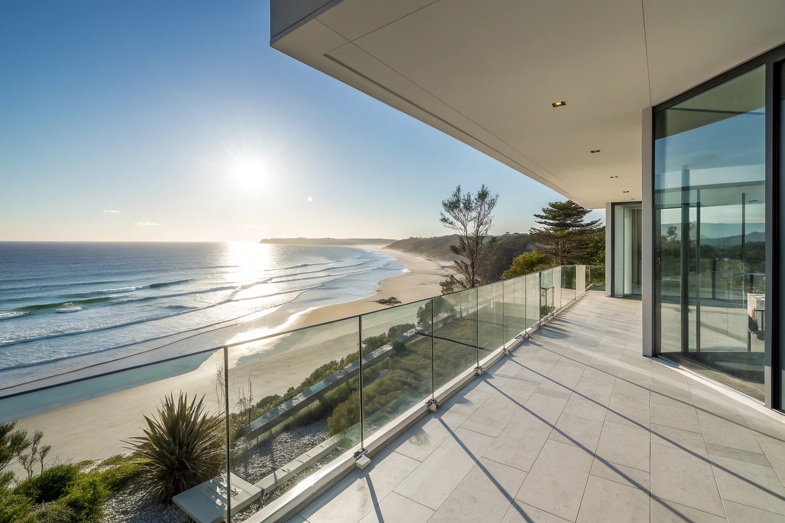 Modern balcony construction Sunshine Coast with ocean views and glass balustrade